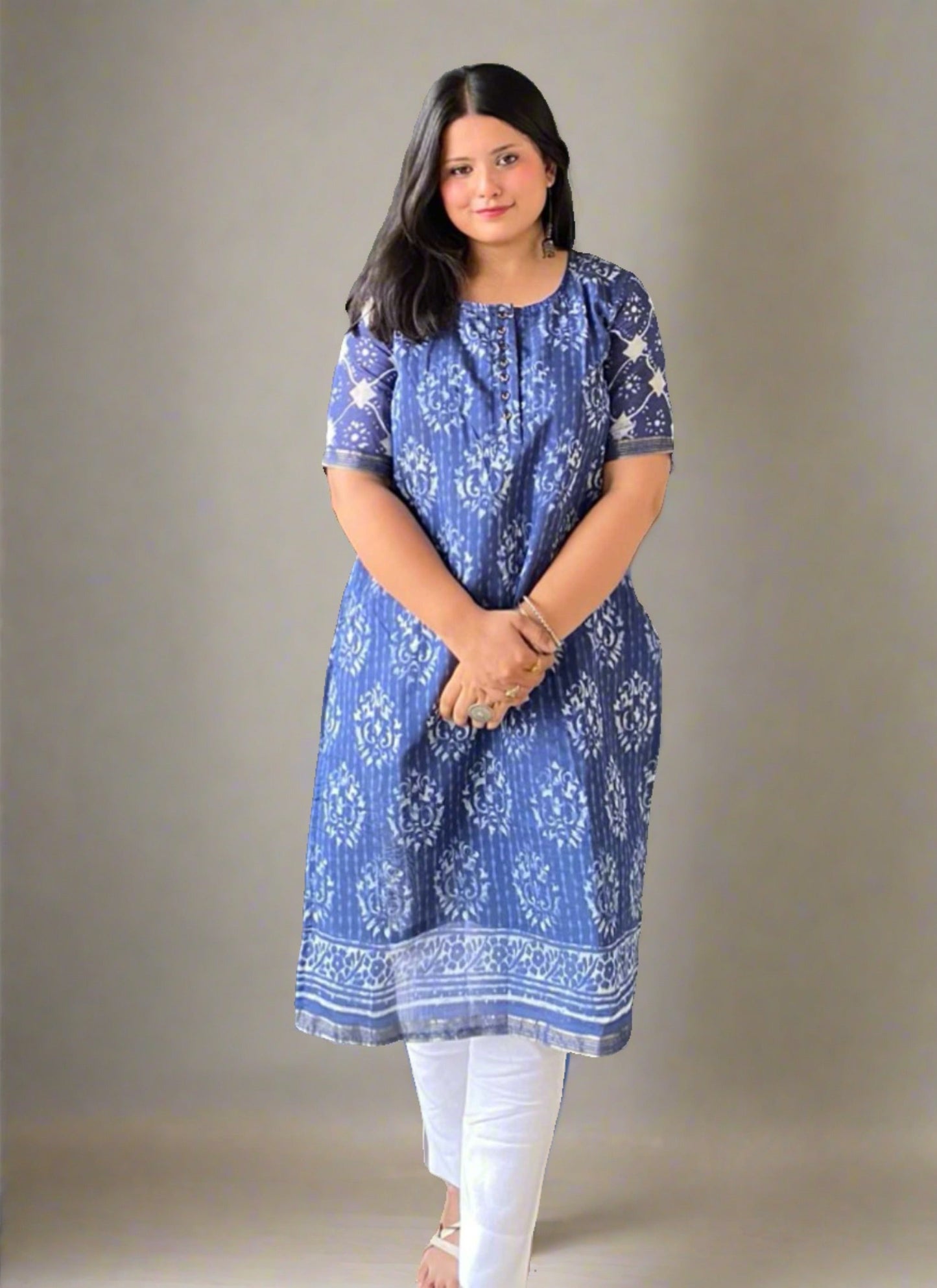 A woman wearing Blue Printed Mul Cotton Kurti