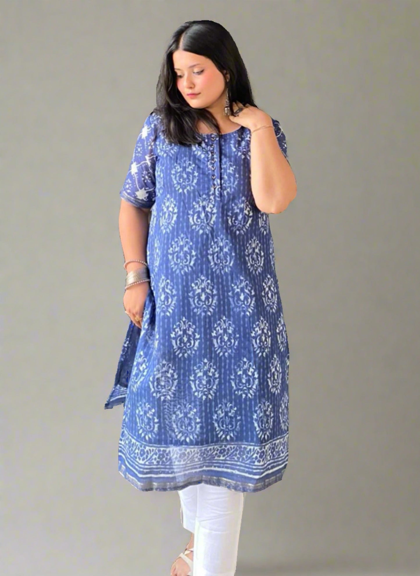A woman wearing Blue Printed Mul Cotton Kurti
