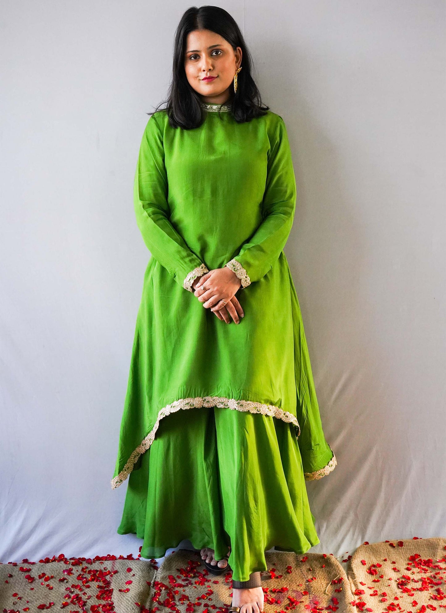 A women wearing Green High Low Kurti
