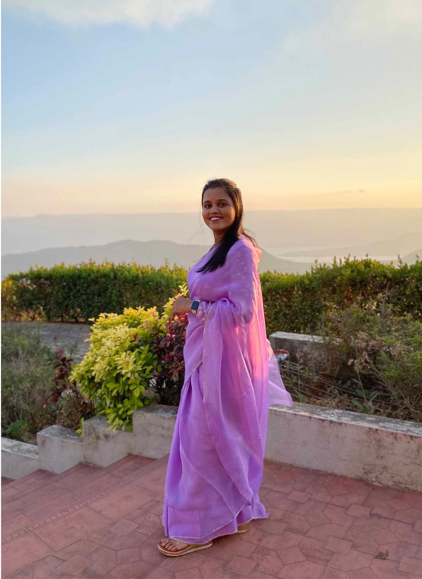 A woman wearing Lilac Plain Georgette Organza Saree