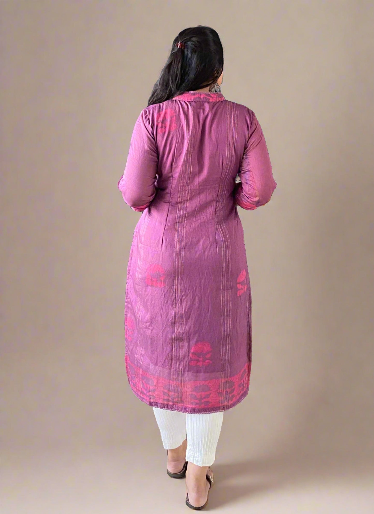 A woman wearing Purple Printed Mul Cotton Kurti