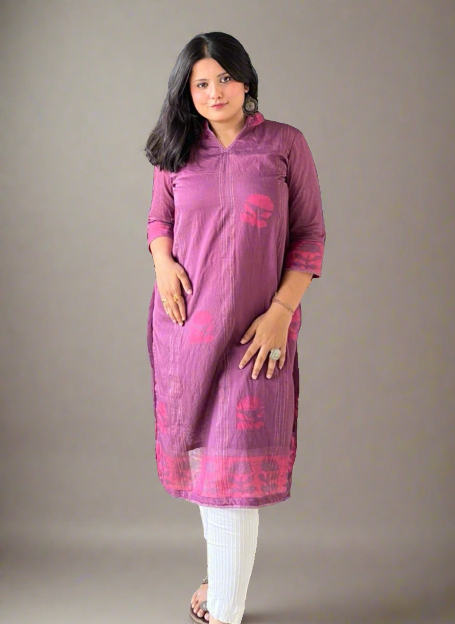 A woman wearing Purple Printed Mul Cotton Kurti