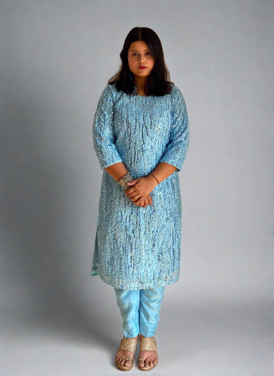 A woman wearing Blue Sequin Kurti Set