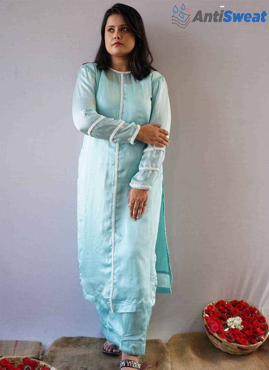 A woman wearing Blue AntiSweat Kurti Set