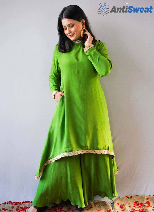 A women wearing Green China Crepe AntiSweat High-Low Kurti
