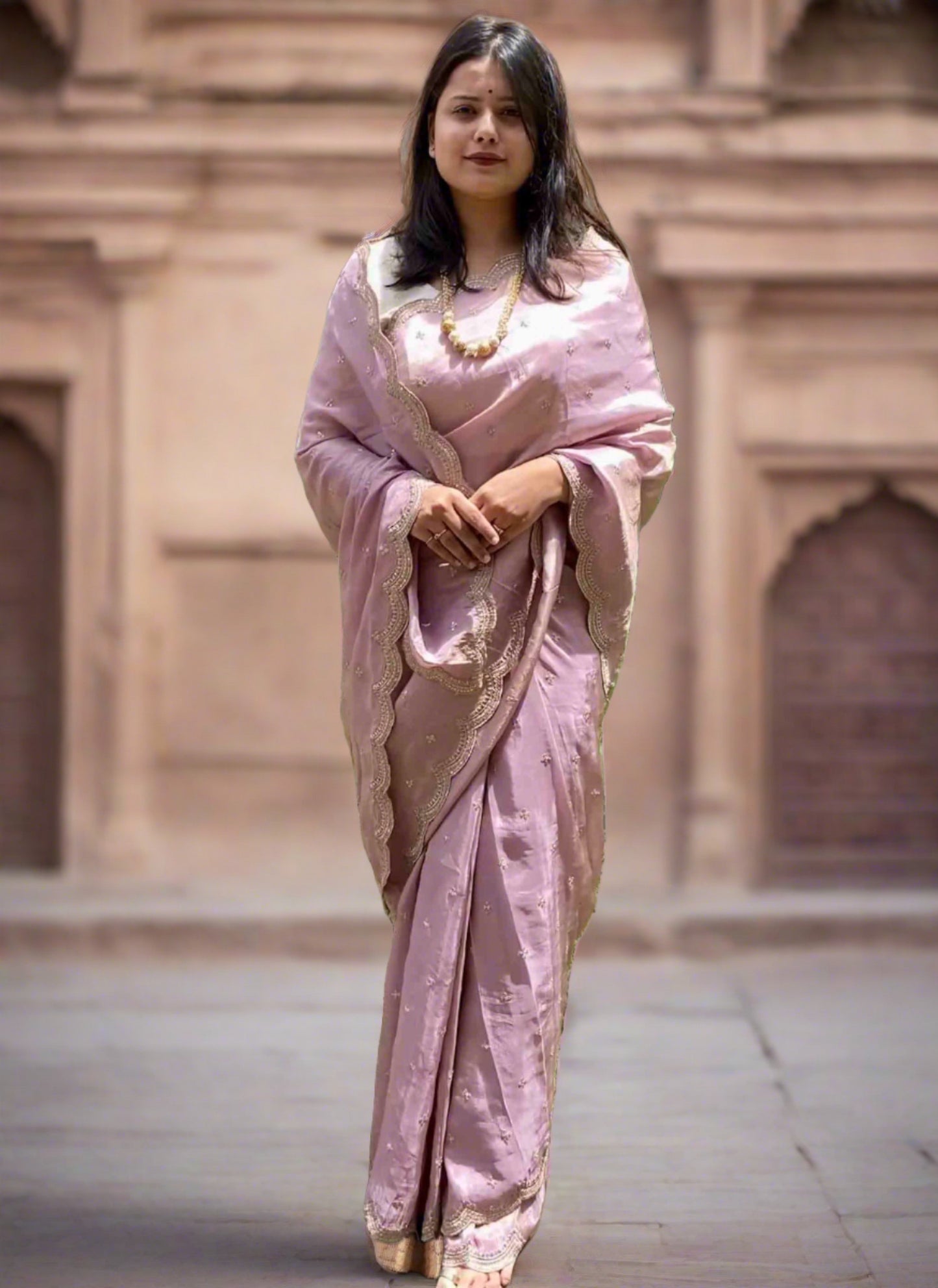 A woman wearing Lilac Banarasi Tissue Saree