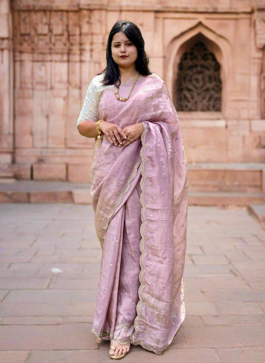 A woman wearing Lilac Banarasi Tissue Saree