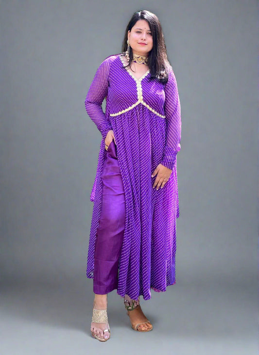 A woman wearing Purple Leheriya Kurti Set