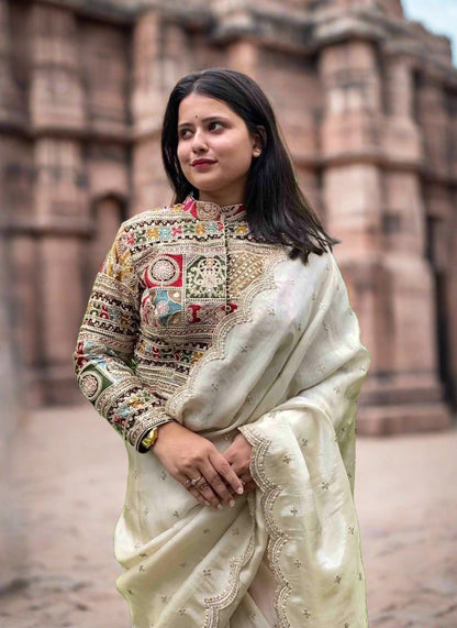 A woman wearing White Banarasi Tissue Saree