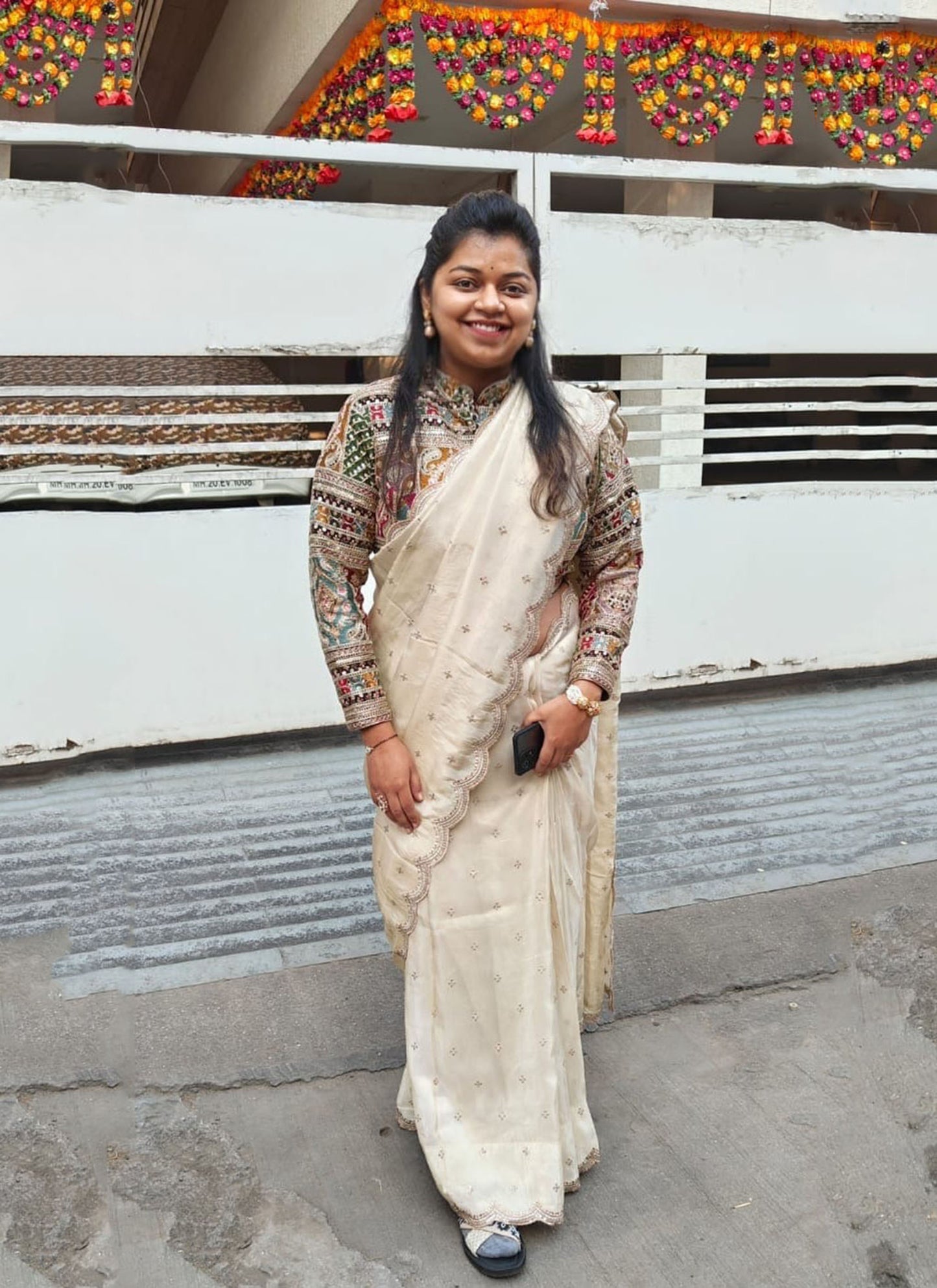 A woman wearing White Banarasi Tissue Saree