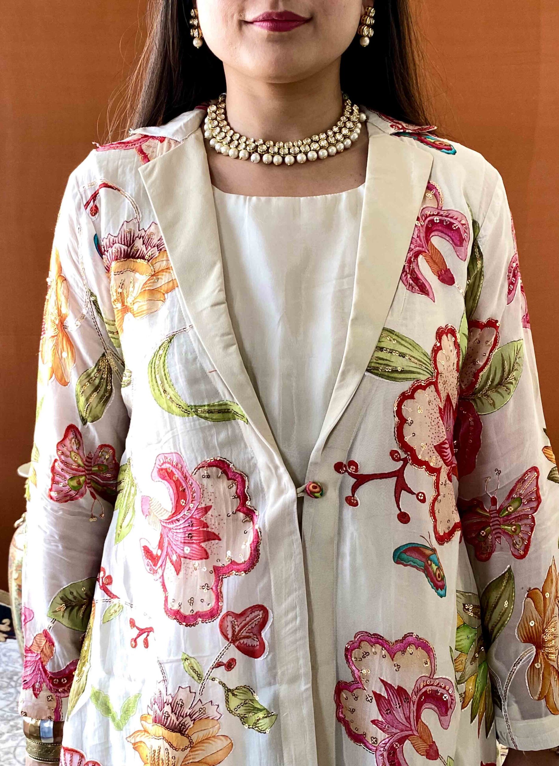 anvi ethnics white habutai gown with floral jacket 1 anvi ethnics white habutai gown with floral jacket 1