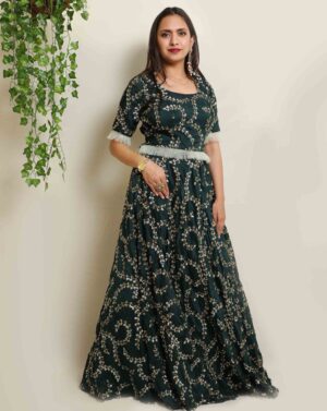 A woman wearing Green Sequin Lehenga